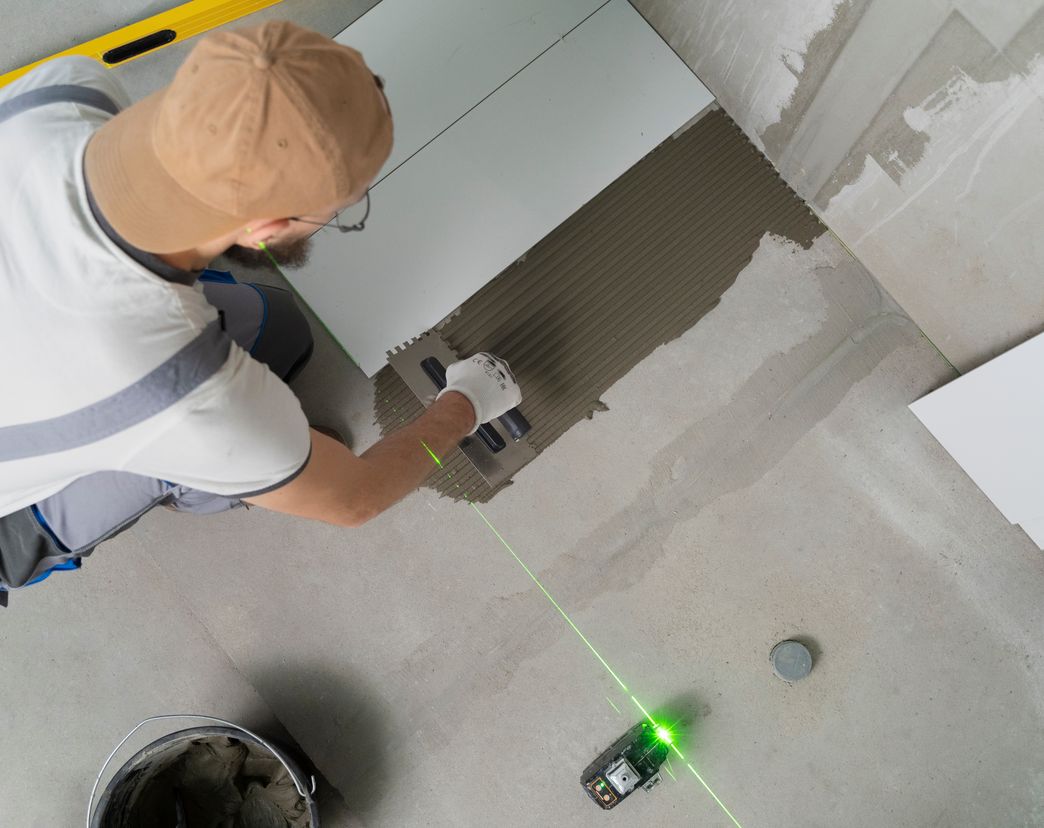 Contactor putting tiling into house